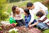 family planting landscape