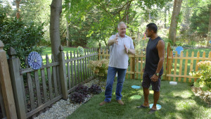 Kris meets with pet adopter to discuss the family yard